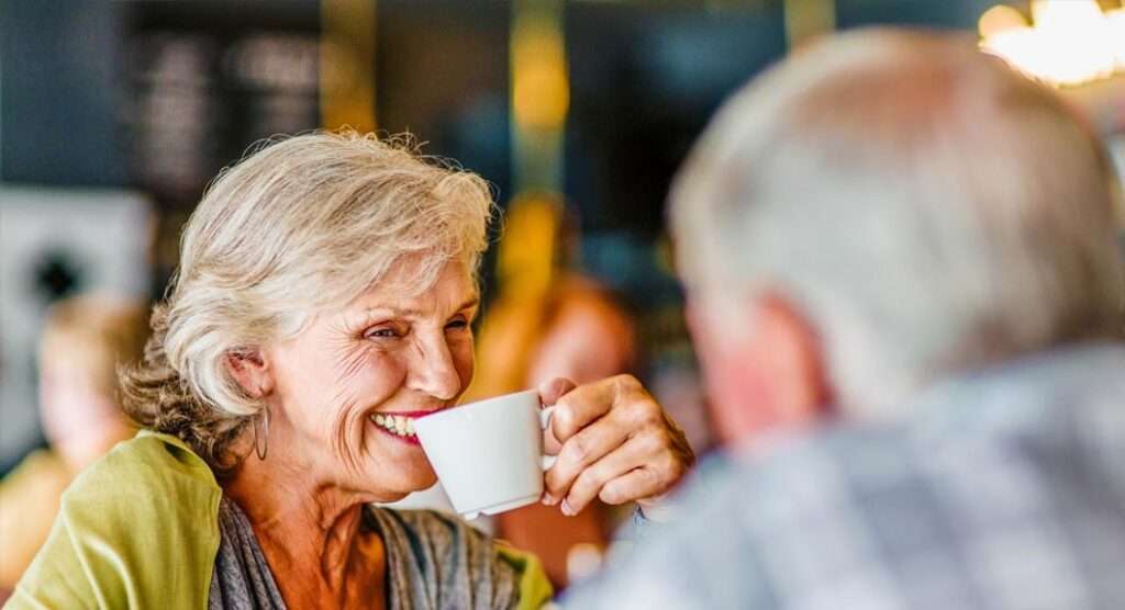 Senior couple having coffee
