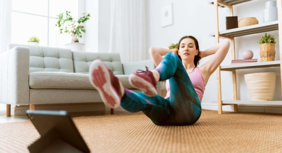 woman doing exercises at home