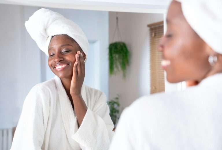 Skincare, face and cosmetic cream of a woman using facial beauty products morning self care.